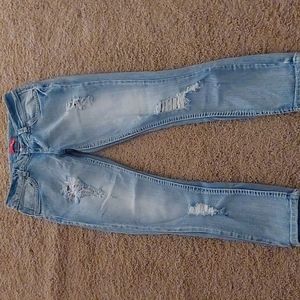 Distressed Faded Blue Jeans